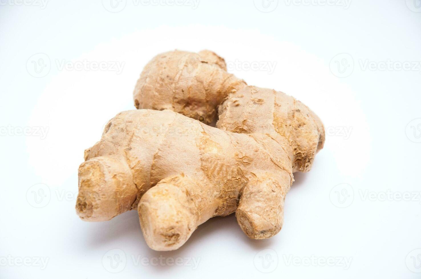 A piece of ginger on a white background photo