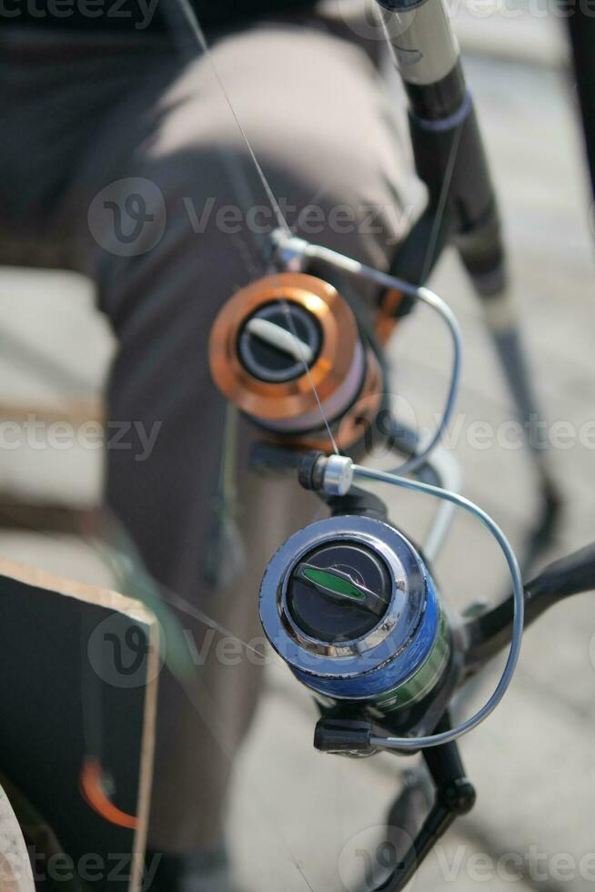 fishing rod with reel close up. photo