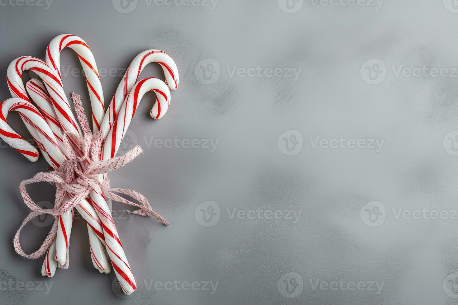 AI generated candy canes on a gray background photo