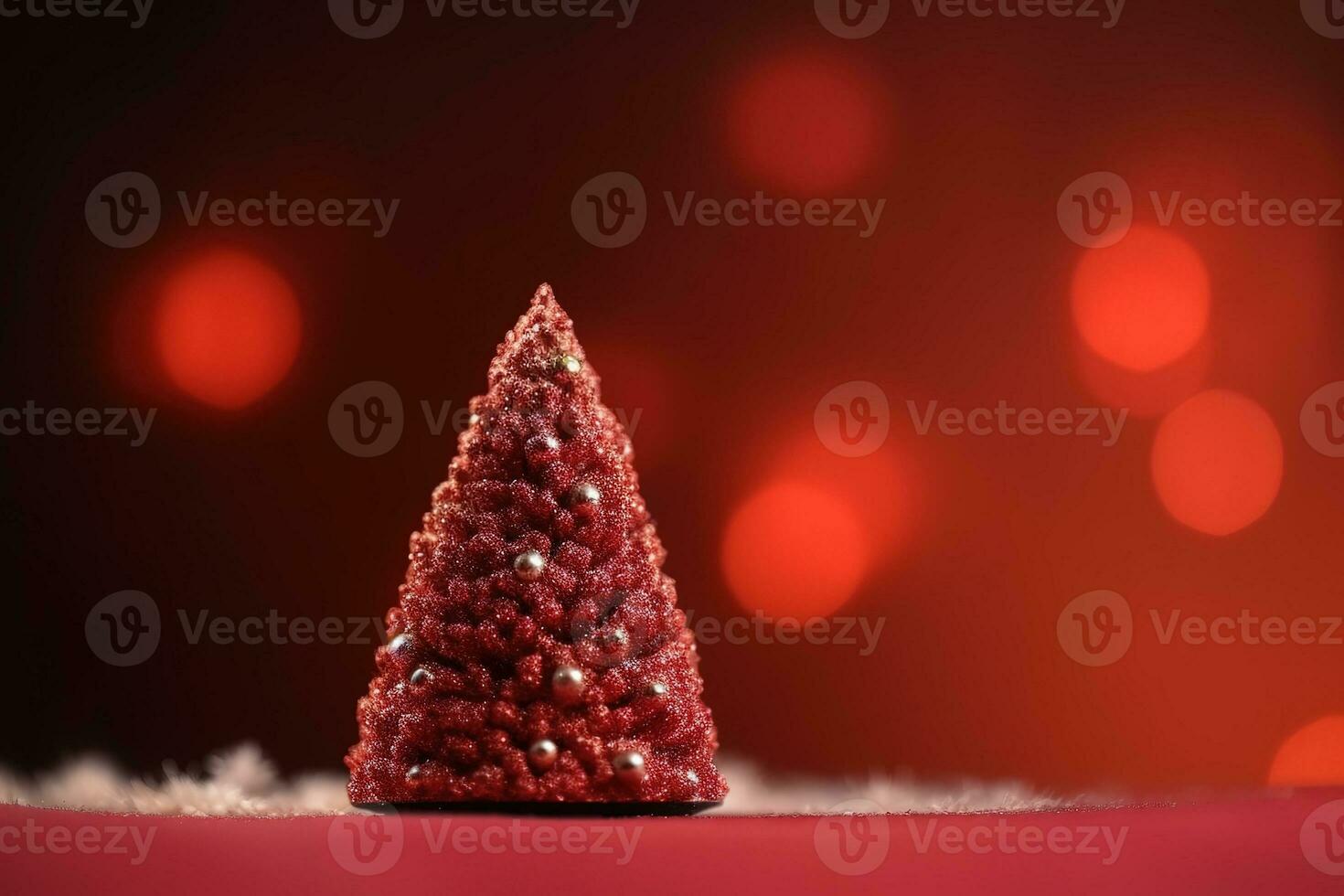 AI generated a small christmas tree is sitting on a red background photo