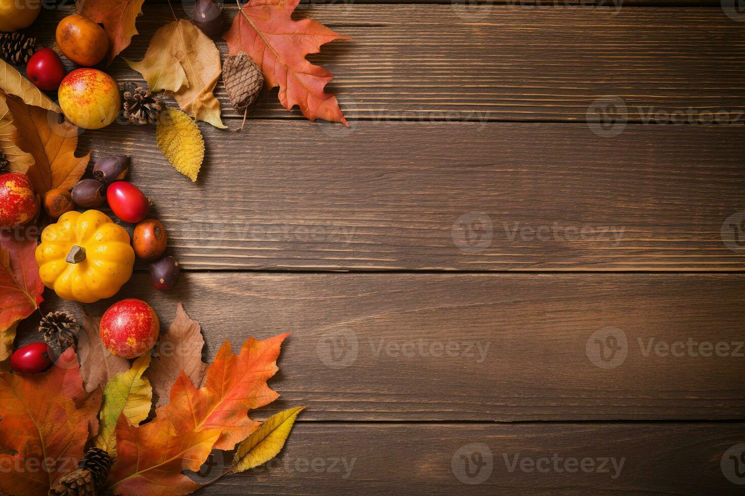 autumn leaves and pumpkins on a wooden table photo