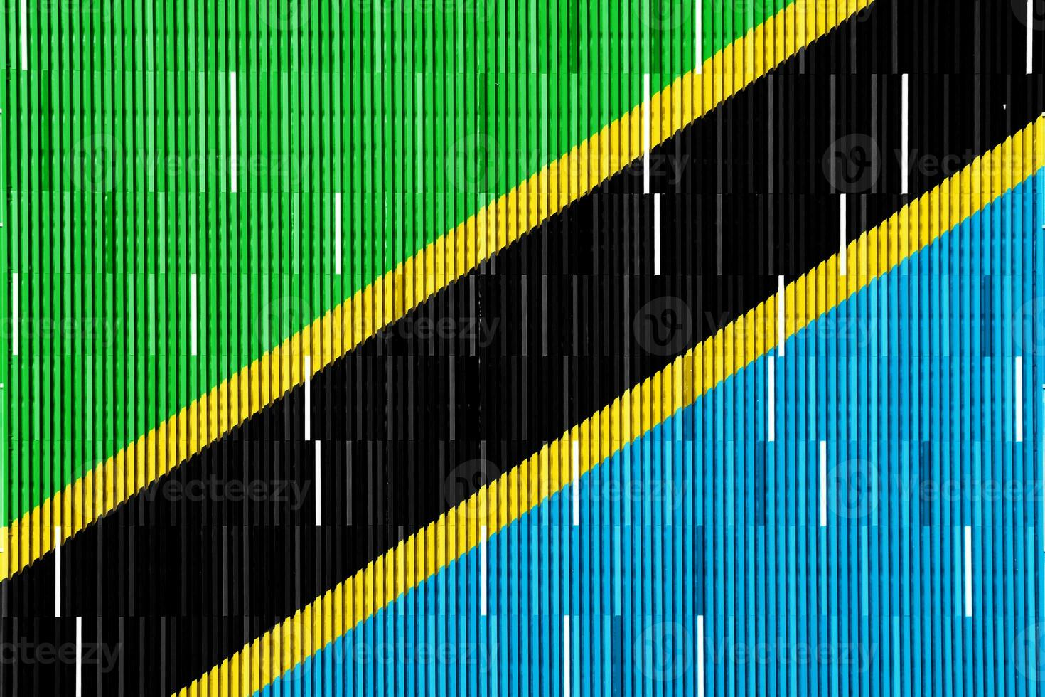 Flag of United Republic of Tanzania on a textured background. Concept collage. photo