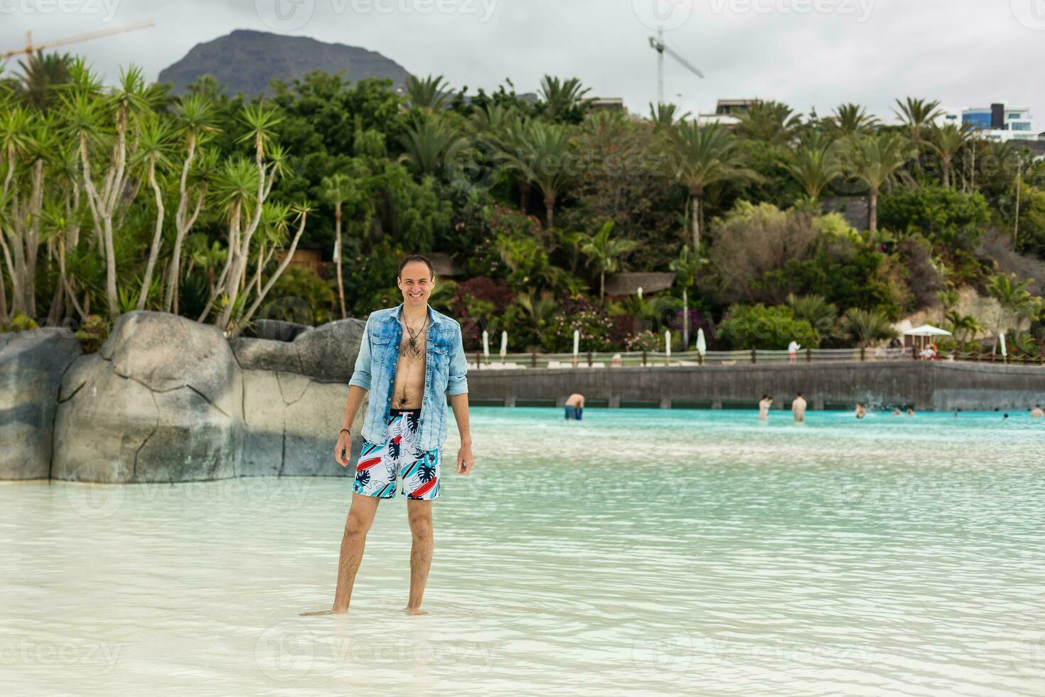 Tourists enjoy water attractions in Siam waterpark in Tenerife, Spain. The Siam is the largest water theme park in Europe. photo