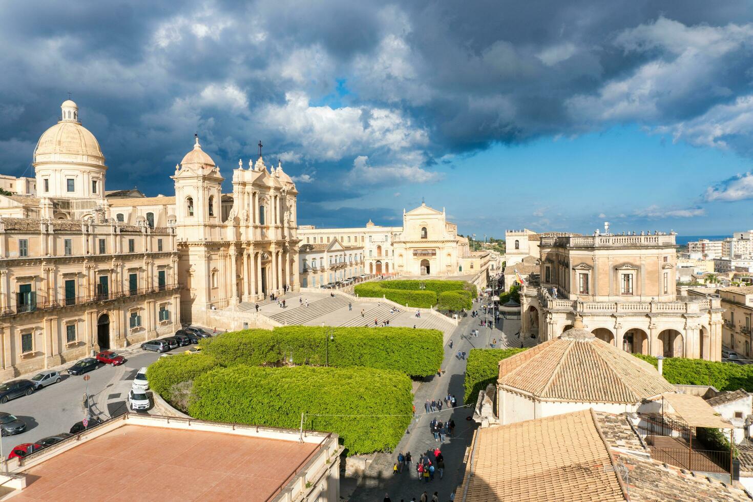 Noto,Italy-May 8, 2022-View of the beautiful Cathedral of Noto from the terrace of the church of Santa Chiara during a sunny day photo