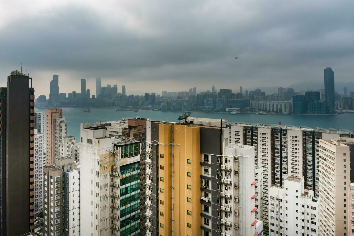 Hong Kong,March 26,2019-Panorama of skyscrapers of hong kong bay during a hazy day photo