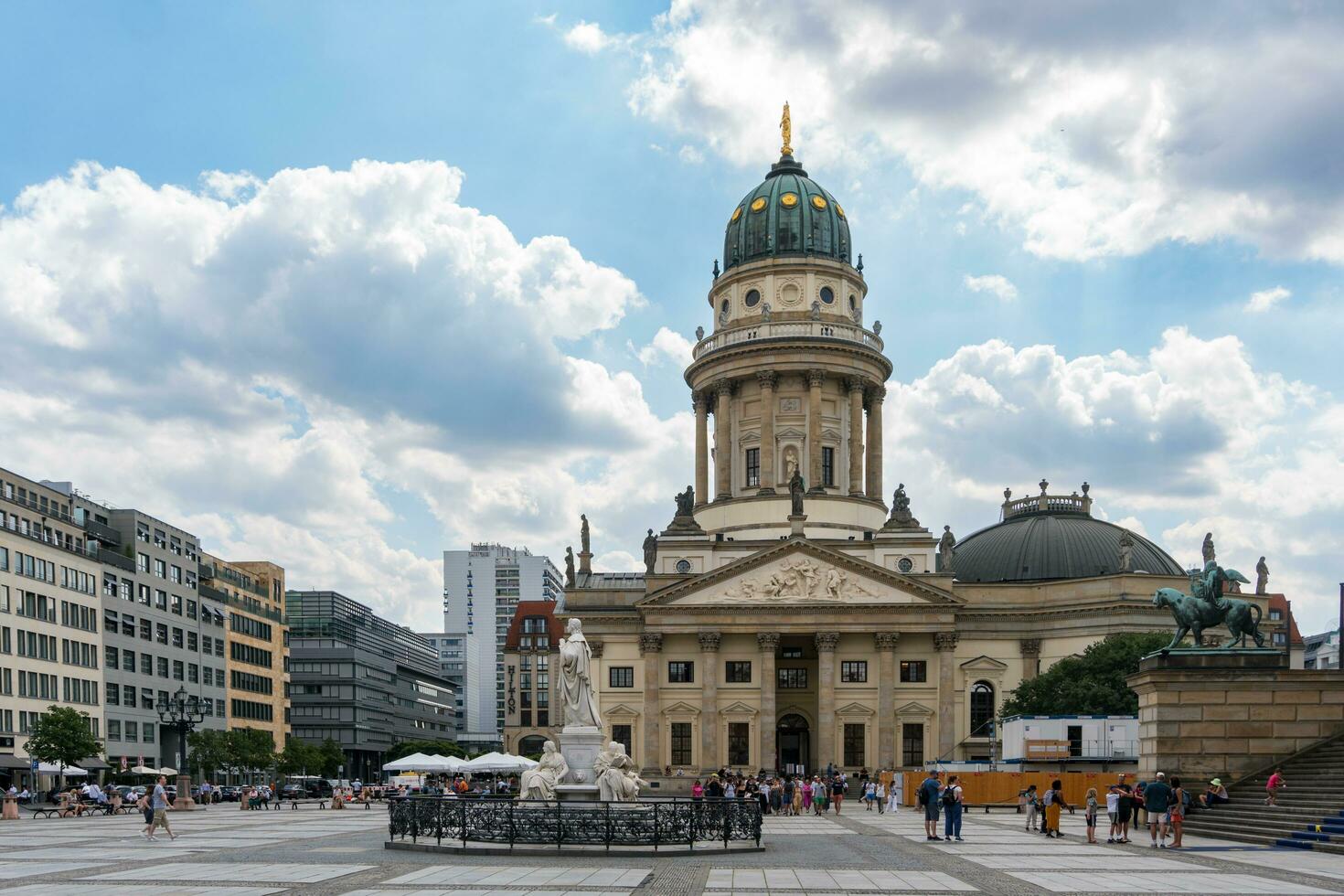 Berlin, Germany-august 9, 2022-view of one of the two churches in Gendarmenmarkt square during a cloudy day photo