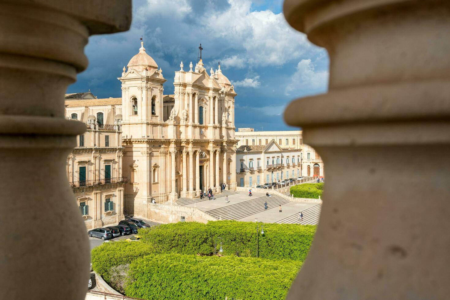 Noto,Italy-May 8, 2022-View of the beautiful Cathedral of Noto from the terrace of the church of Santa Chiara during a sunny day photo