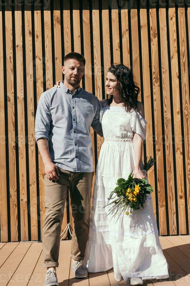 Wedding walk in the pine forest. Sunny day. photo