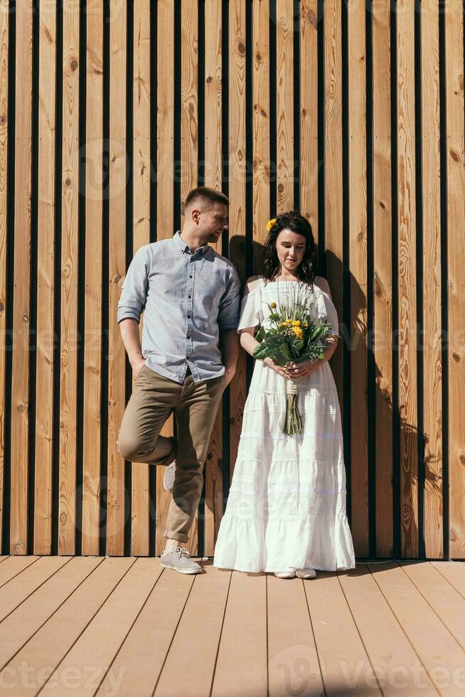 Wedding walk in the pine forest. Sunny day. photo