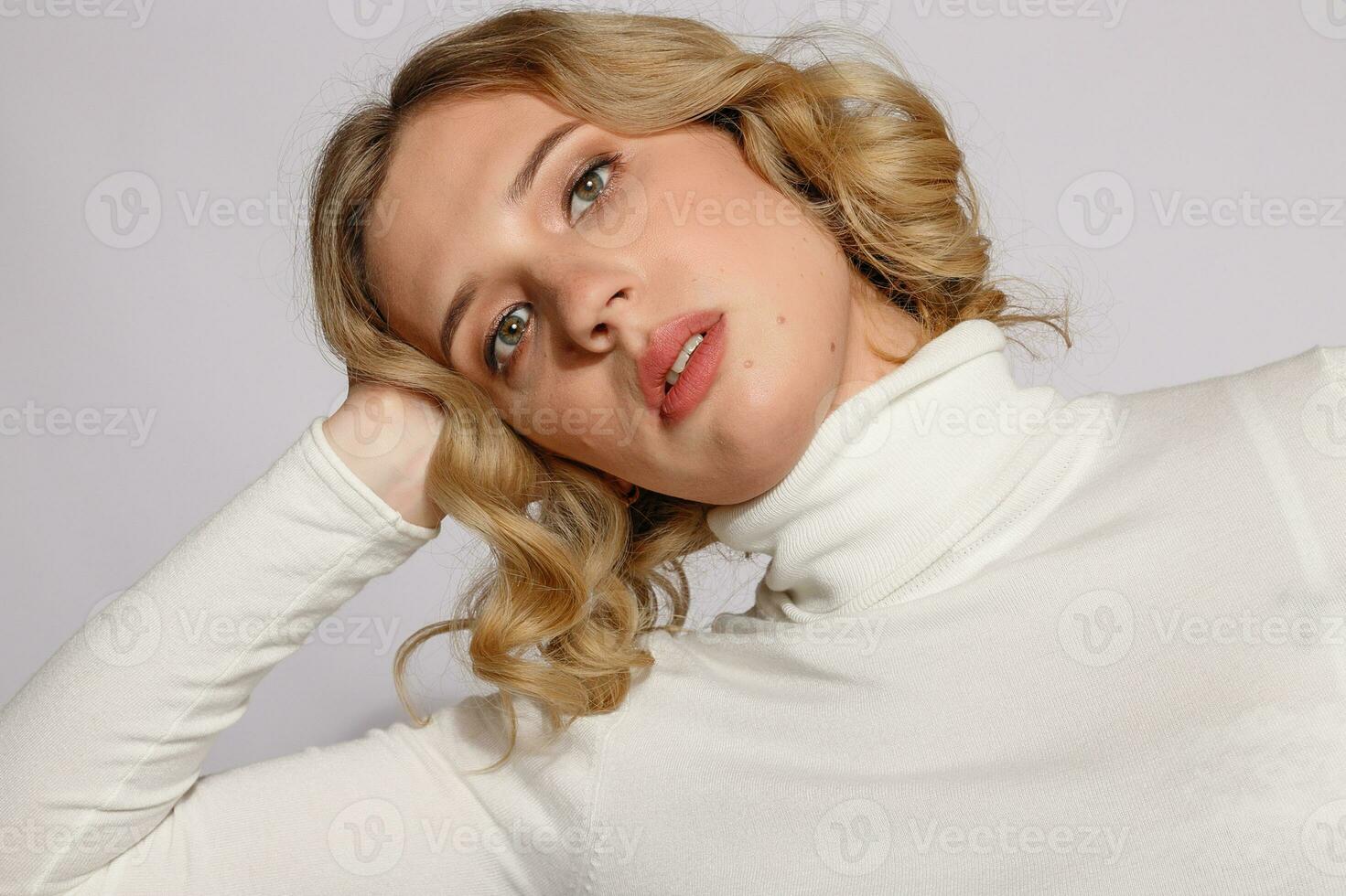 Portrait of beautiful transgender woman with blond hair photo