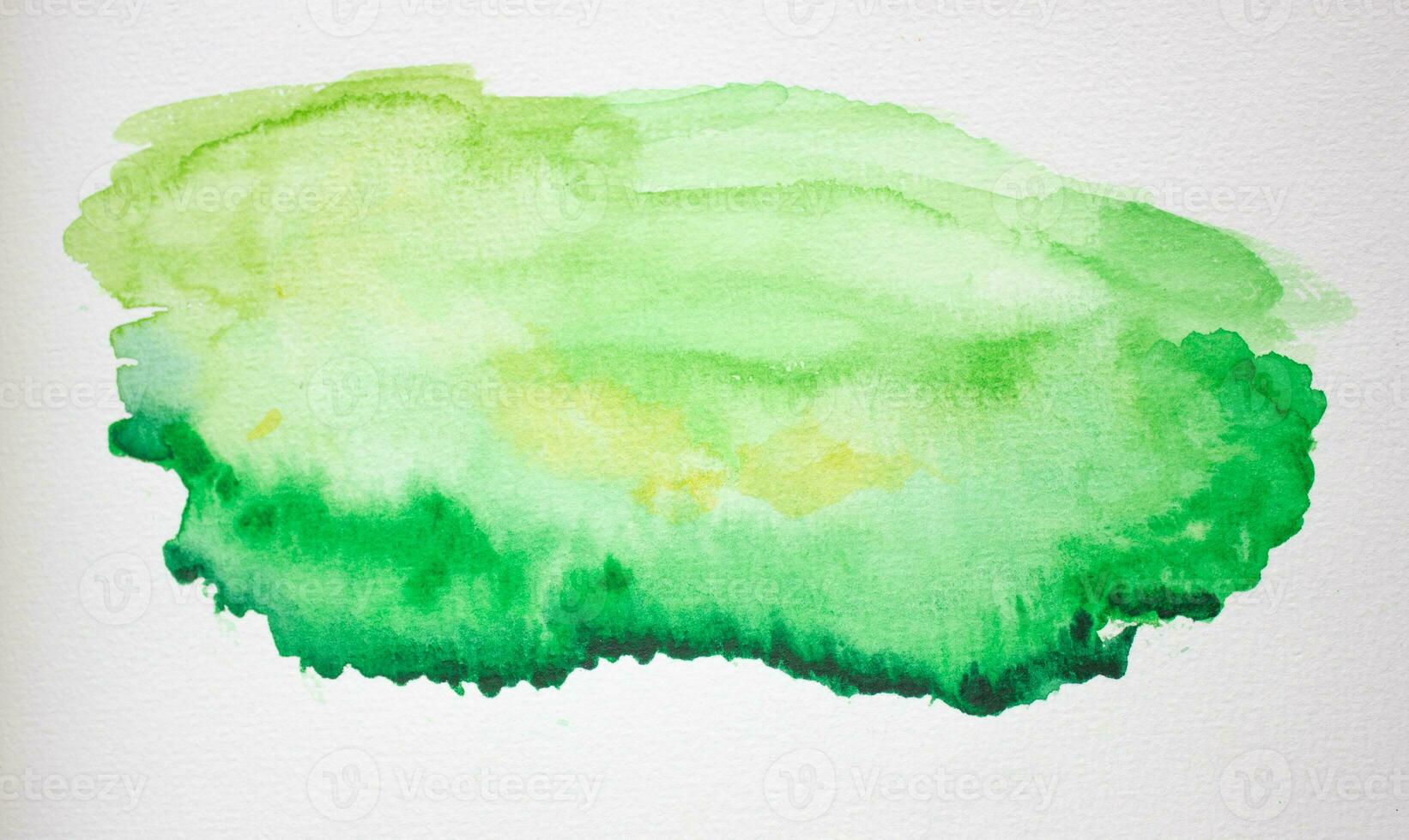 Abstract green watercolor background on a white background. photo