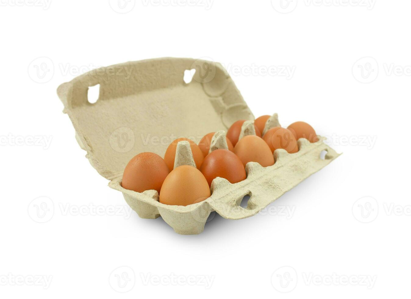 Fresh chicken eggs in a cardboard box isolated on a white background. photo