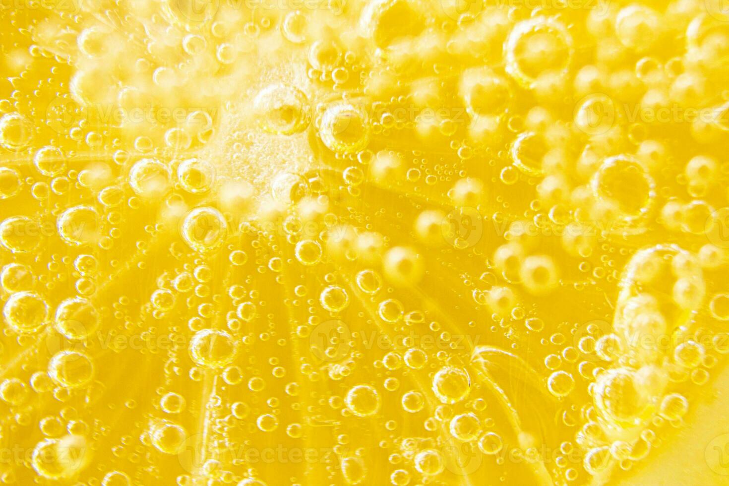 Lemon texture, macro. Abstract yellow summer background. photo