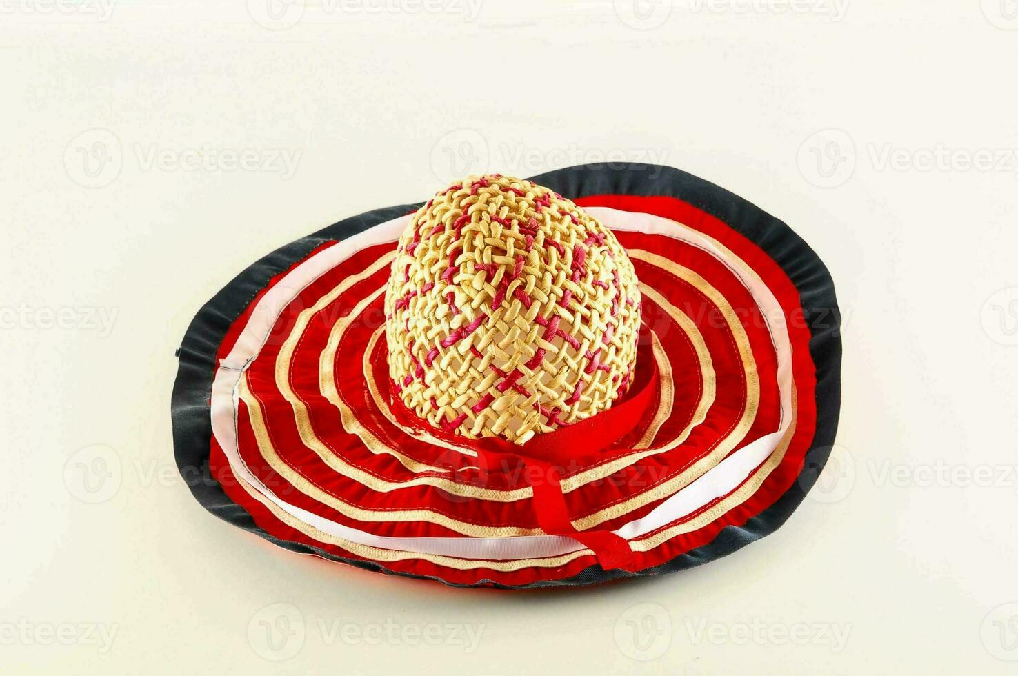 a straw hat with red, white and blue stripes photo