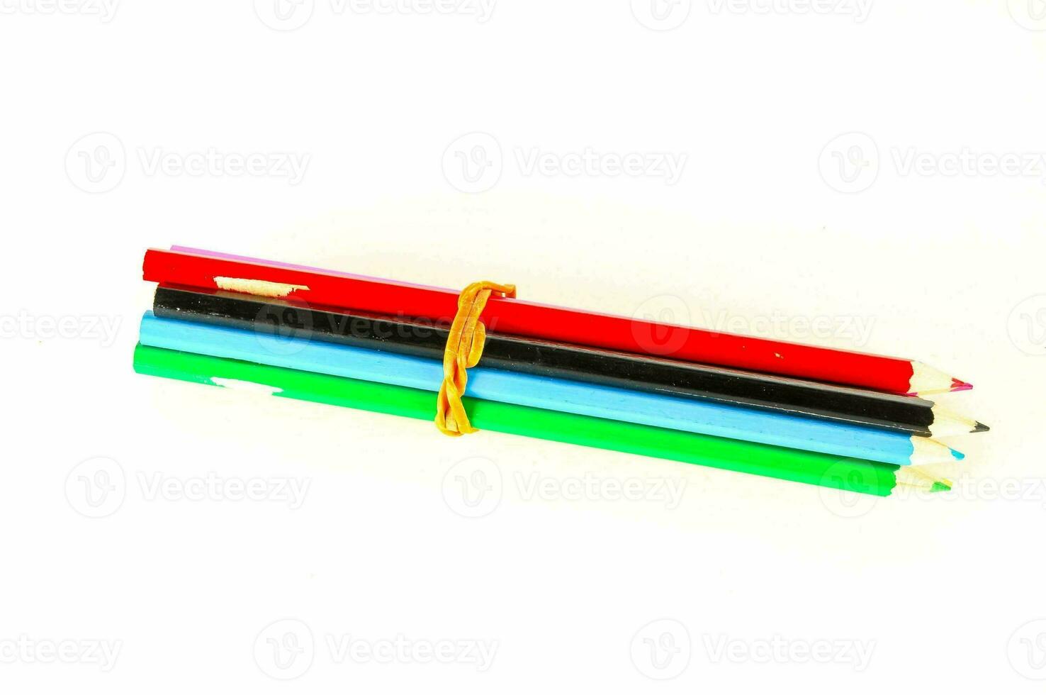 a group of colored pencils tied together with a string photo