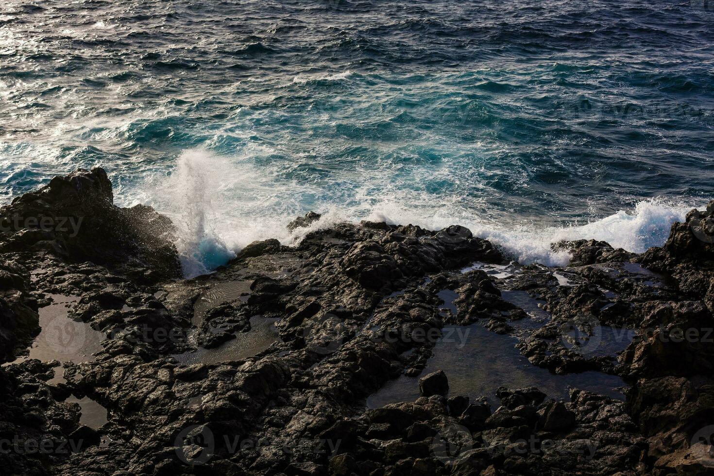 Atlantic ocean wild coast, Tenerife, Canary islands, Spain photo