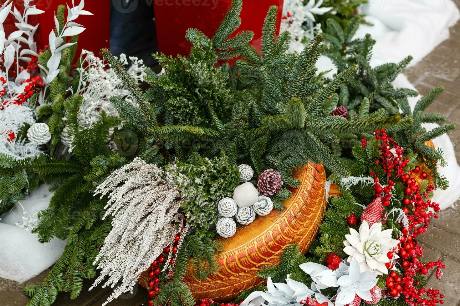 Christmas background with decorative star, fir branches and pine cones photo