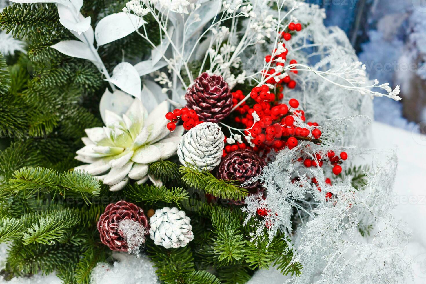 Christmas background with decorative star, fir branches and pine cones photo