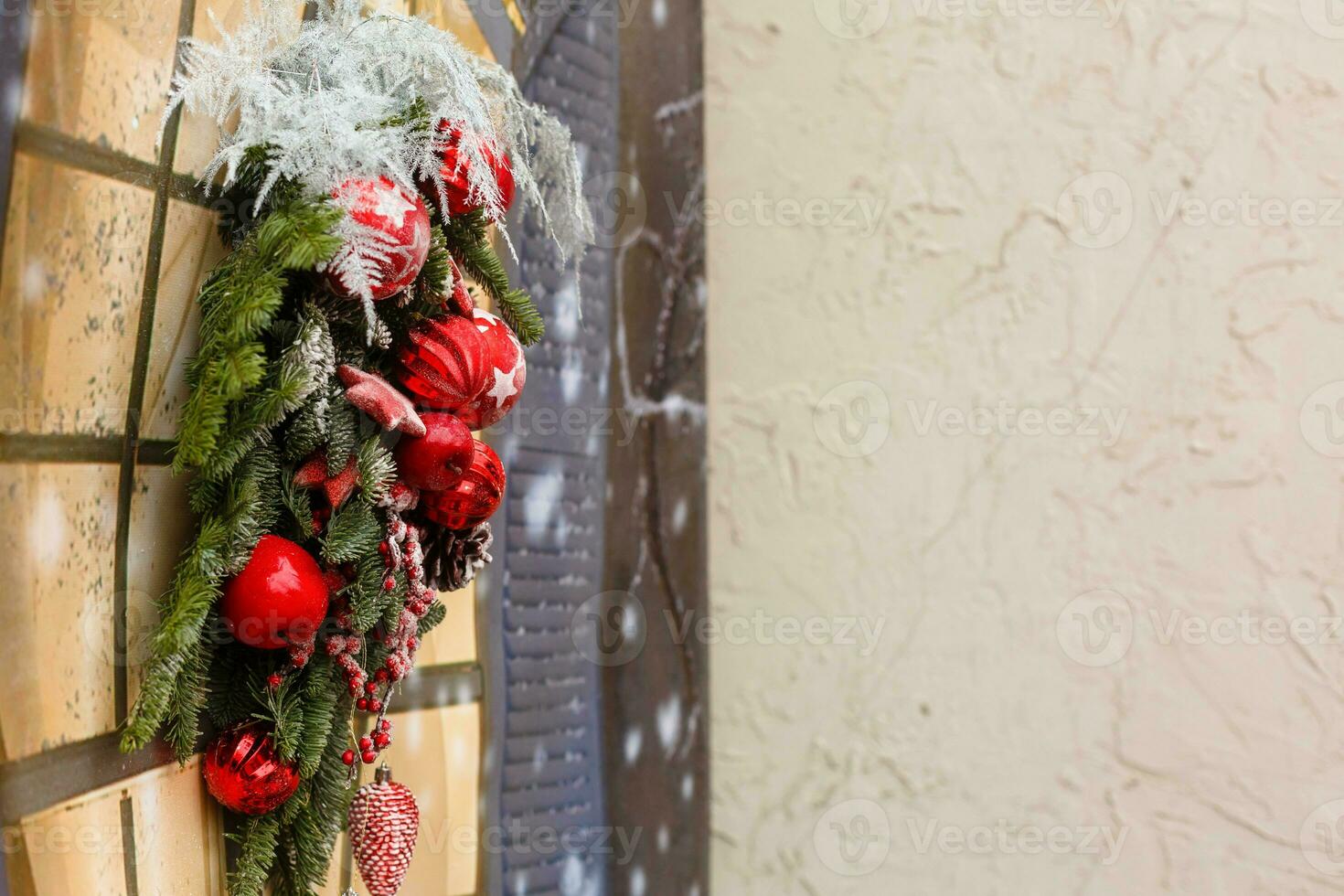 Christmas background with decorative star, fir branches and pine cones photo