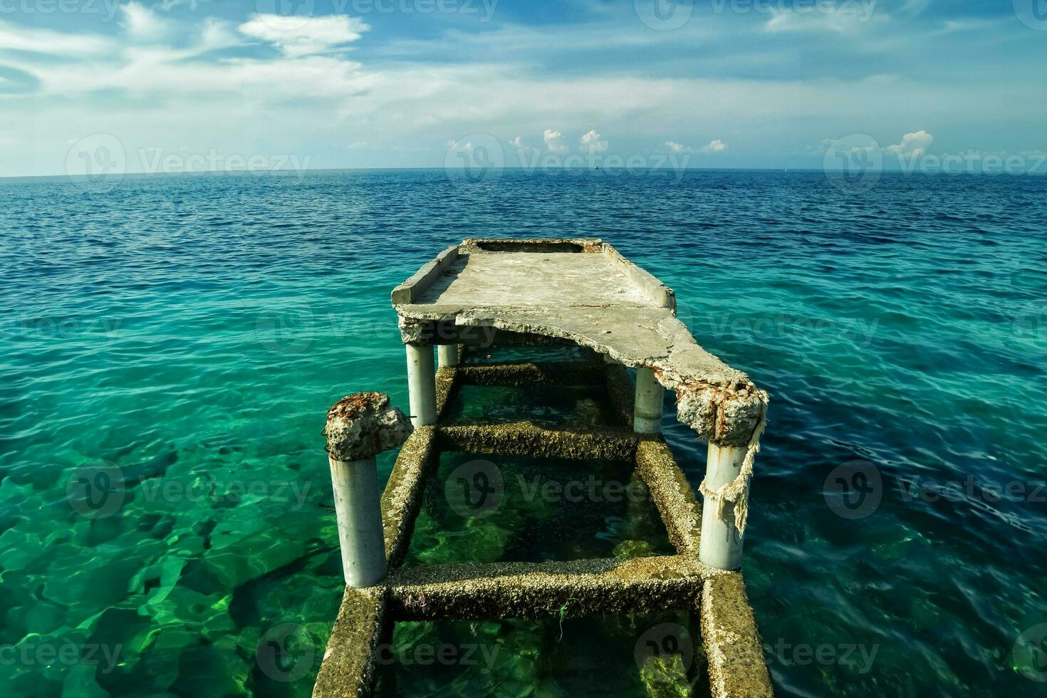 Broken pier of the harbor photo