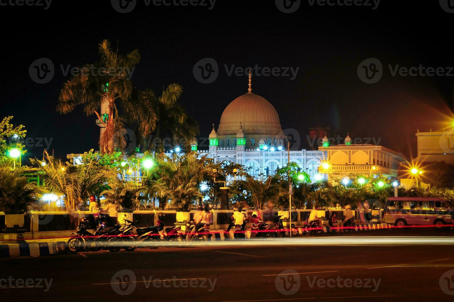 The Jami Mosque in the night photo is the single largest place of worship in the city of Pasuruan, Indonesia