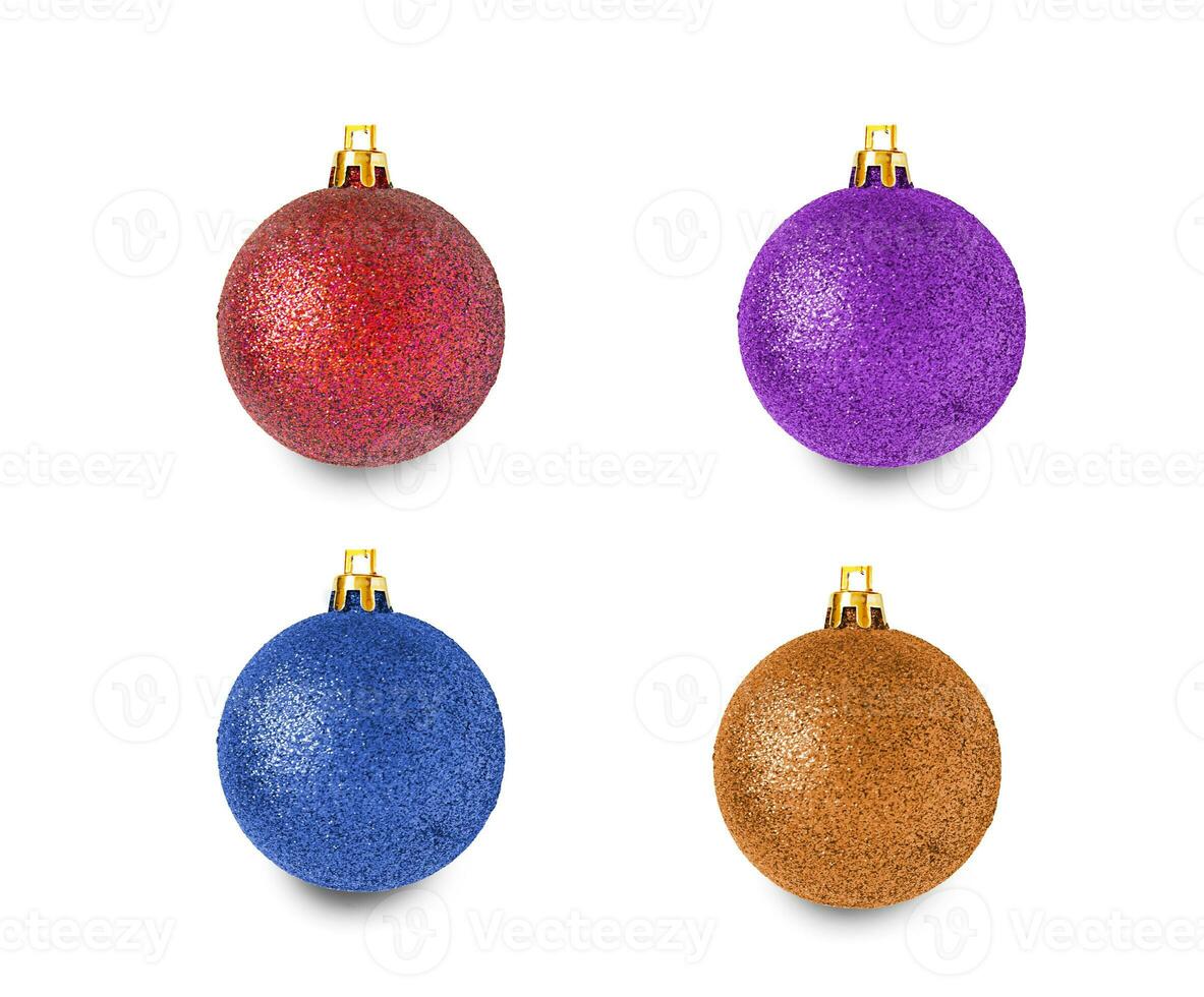 Four hanging multicolored christmas balls isolated on white background. photo