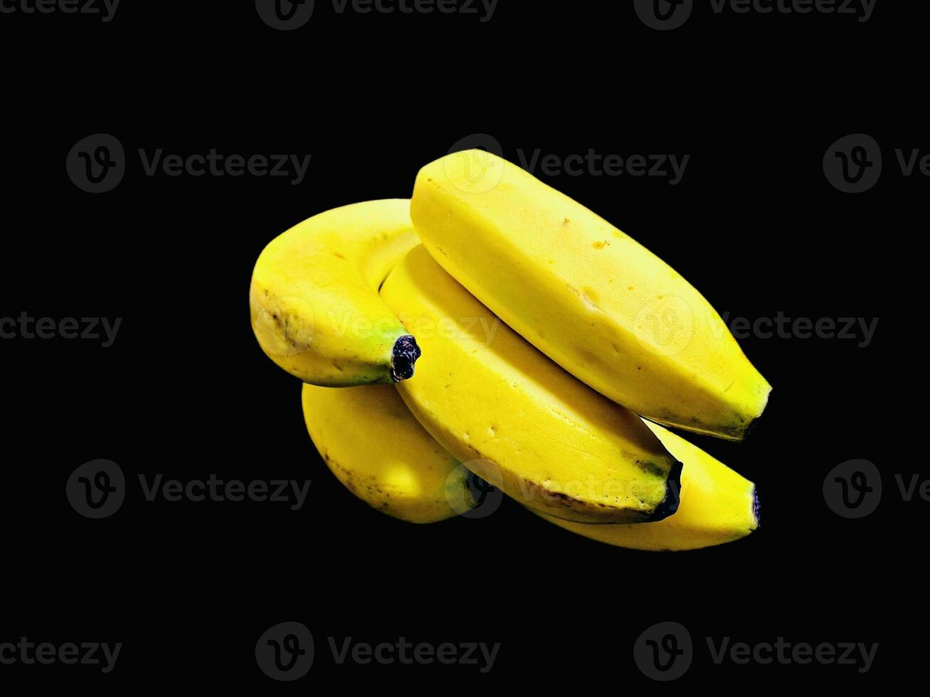Banana bunch isolated on black background. Photos in HD quality