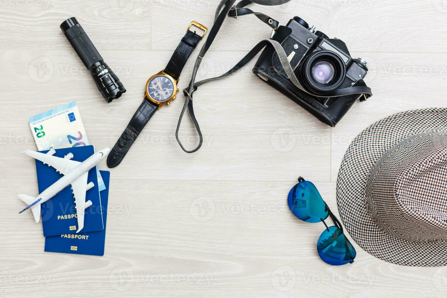 Travel Planning. Airplane, watch, passport. Preparation for Traveling and Flat lay Concept. photo