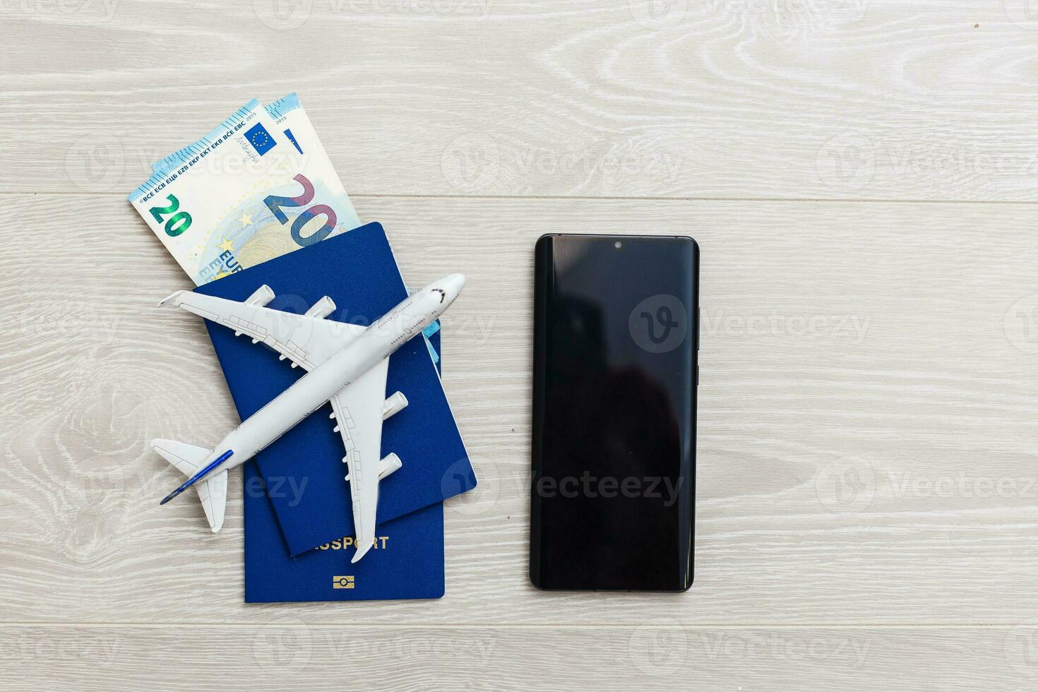 Mockup image of mobile smartphone , airplane and check book isolated on white background. Business technology trip and travel,paycheck concept. photo