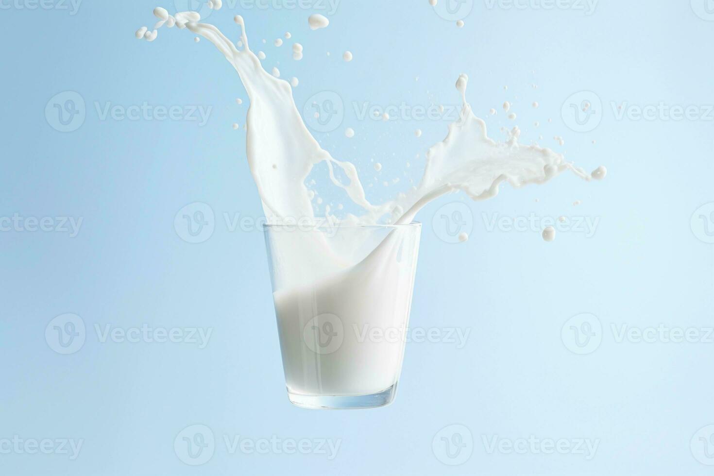 AI generated Glass of splashing milk on light blue background. AI generated. photo