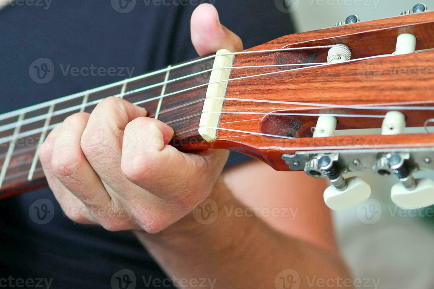 Close-up of an acoustic guitar. photo