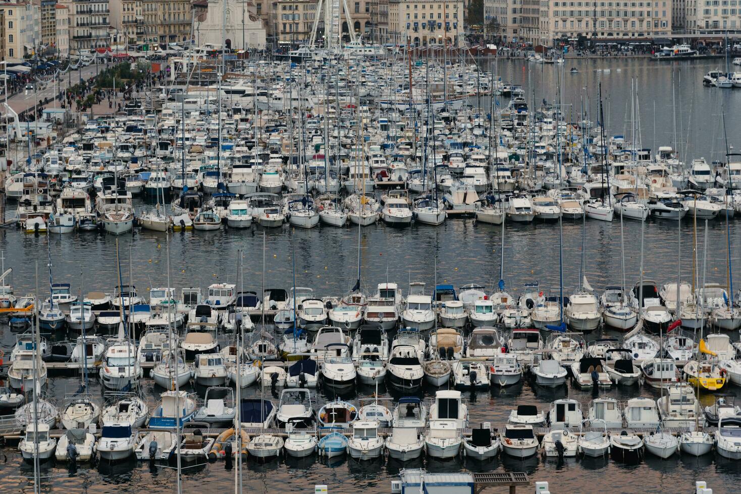 MARSEILLE, FRANCE - NOV 12, 2021 - Old port of Marseille during sunset photo