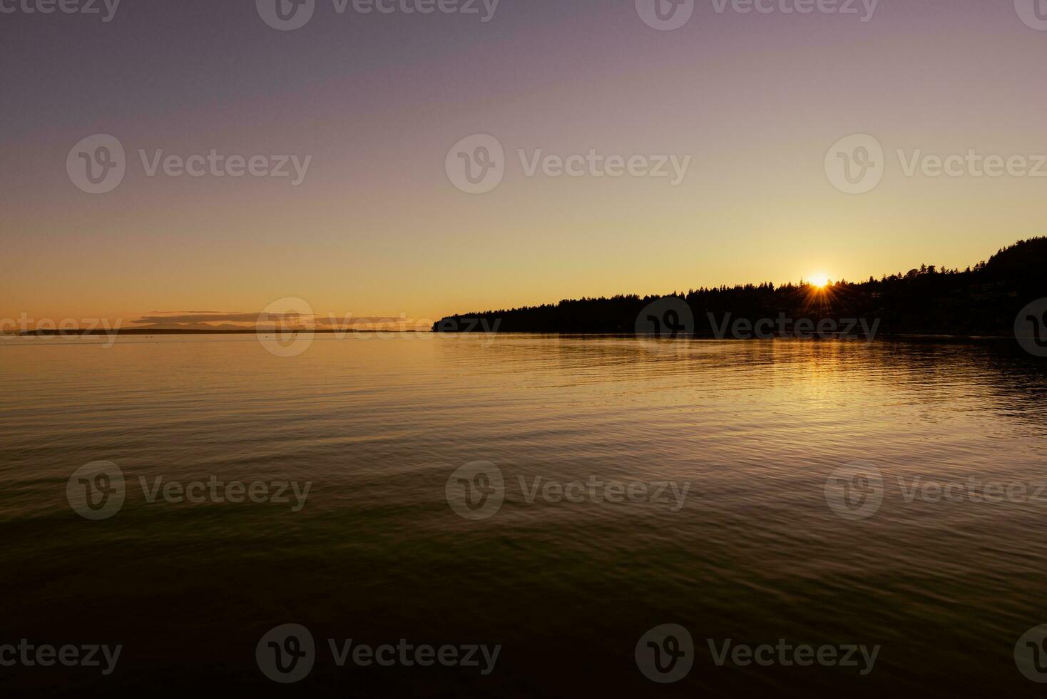 Spectacular sunset in Vancouver bay photo
