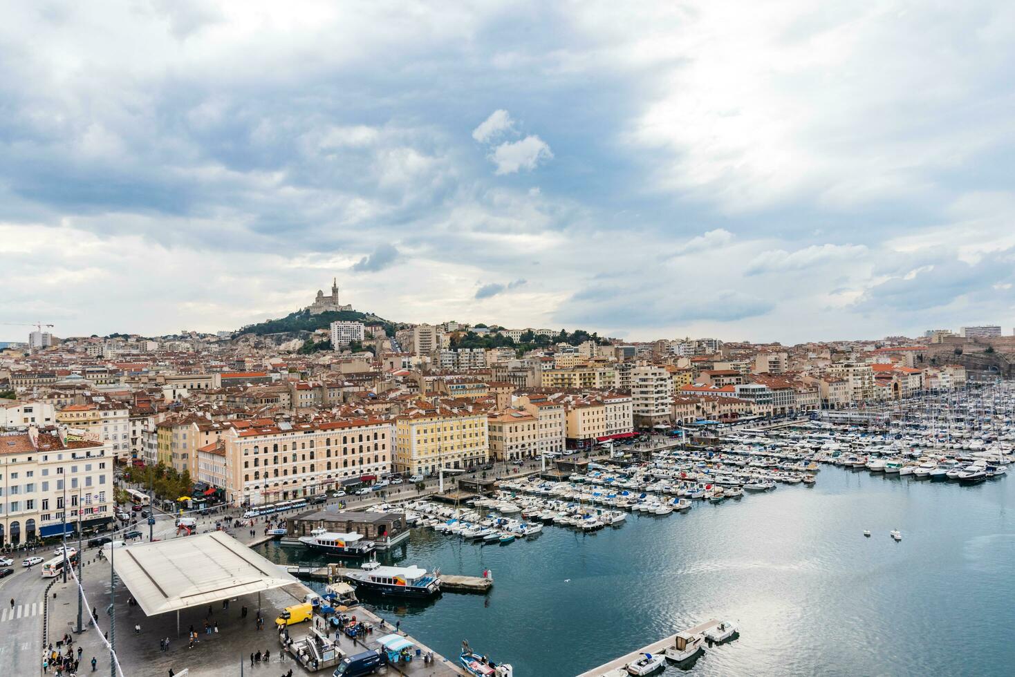 MARSEILLE, FRANCE - NOV 12, 2021 - Aerial view on the Notre Dame de la Garde and Marseille Vieux Port photo