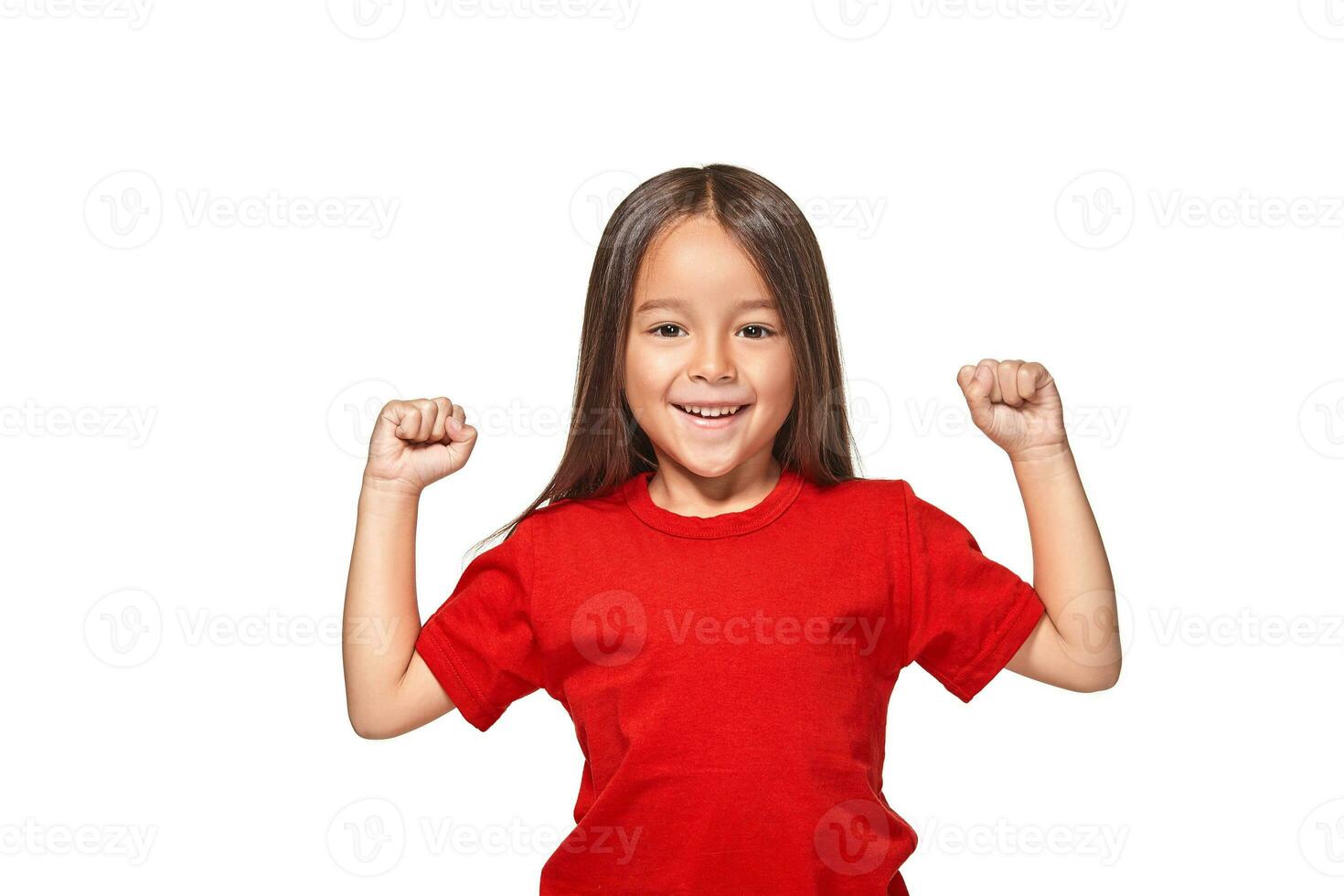 Studio portrait of a happy little girl photo