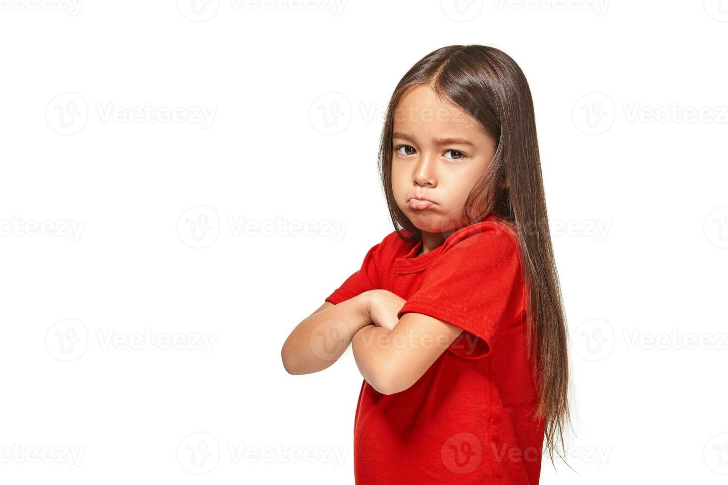 Girl in red t-shirt serious face offended white background photo