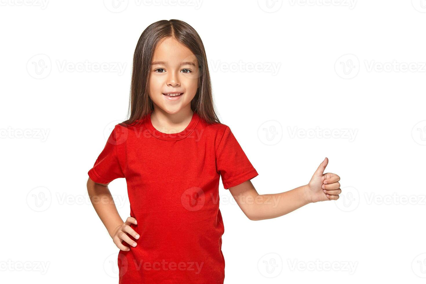 Girl shows in red t-shirt her hand with thumb photo