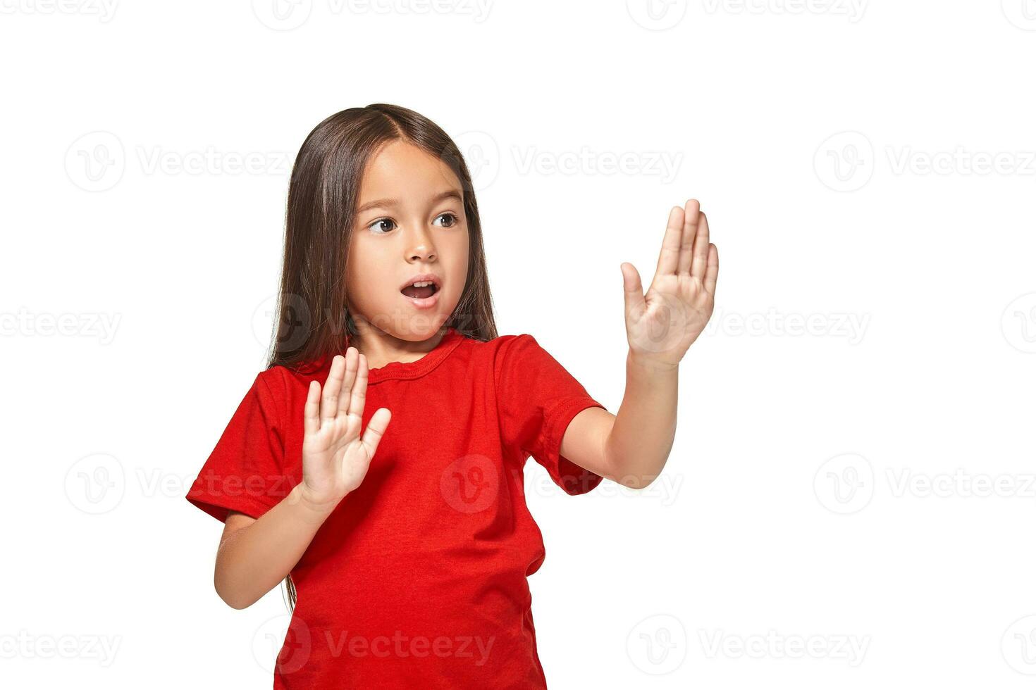 Portrait of little surprised girl excited scared. Isolated on white background photo