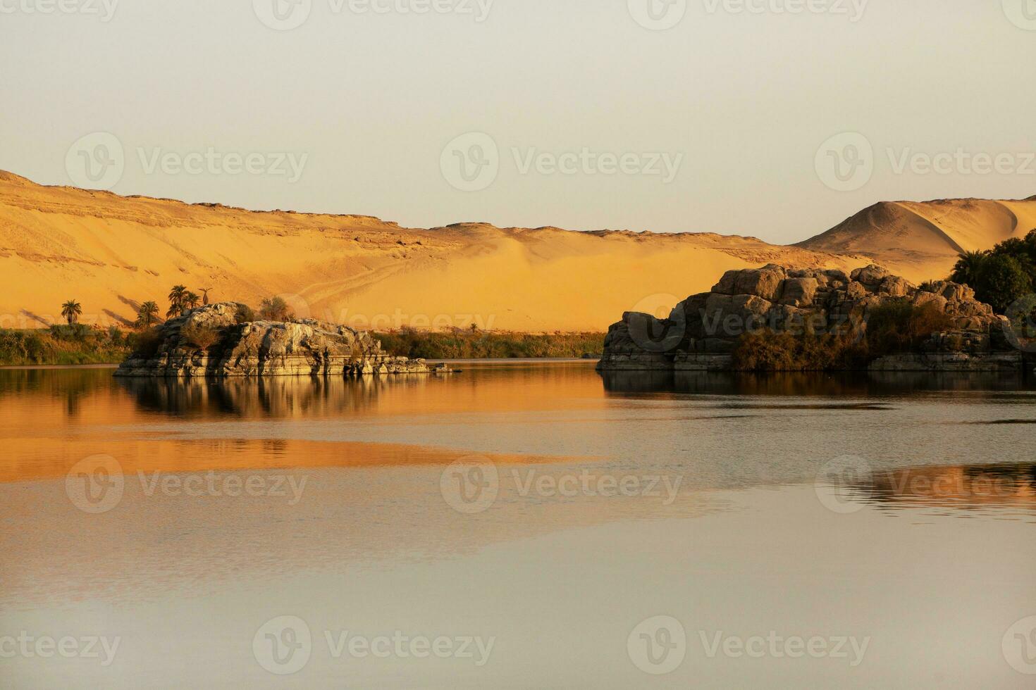 Nile the longest river in Africa. Primary water source of Egypt. Landscape with clear water river. photo