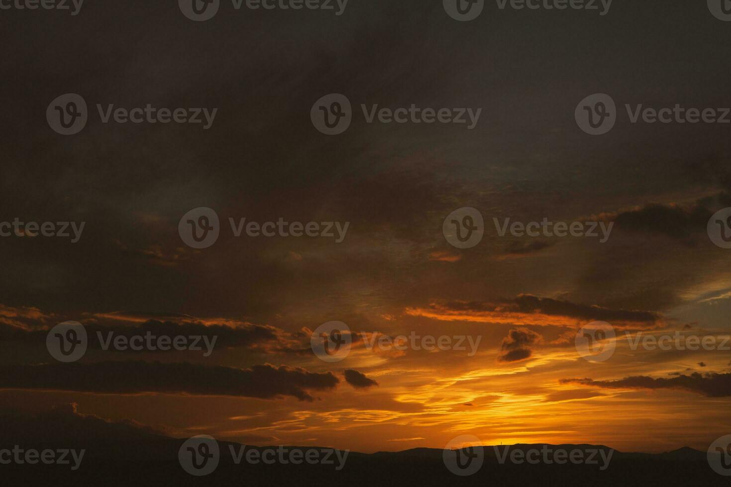 The warm and colorful illumination of the sky during sunset. photo