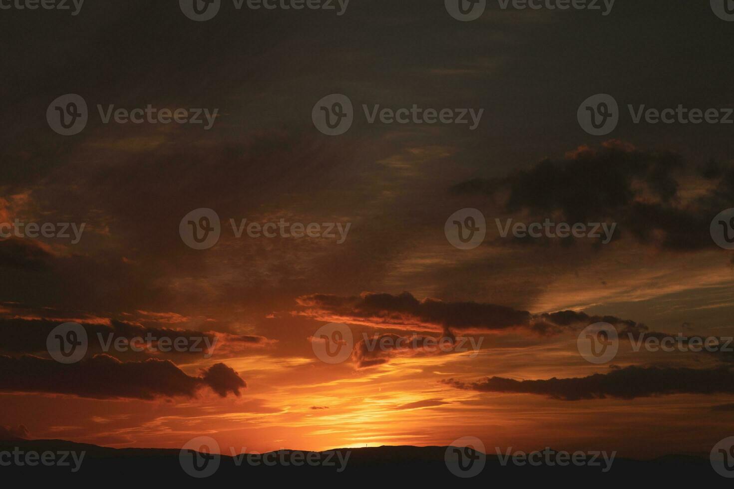 The warm and colorful illumination of the sky during sunset. photo