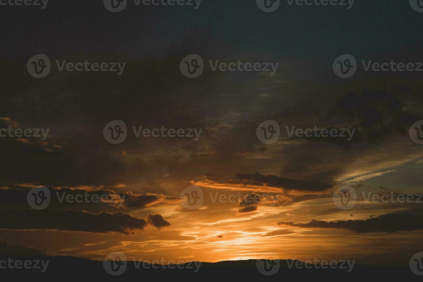 The warm and colorful illumination of the sky during sunset. photo