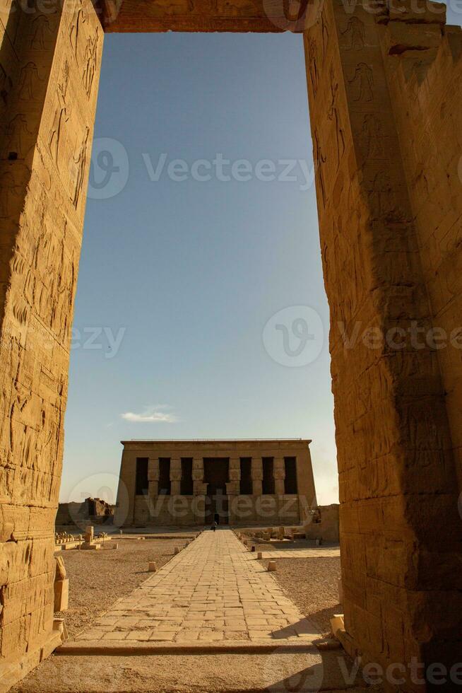 Dendera Temple complex in Egypt. Hieroglypic carvings on wall at the ancient egyptian temple. photo