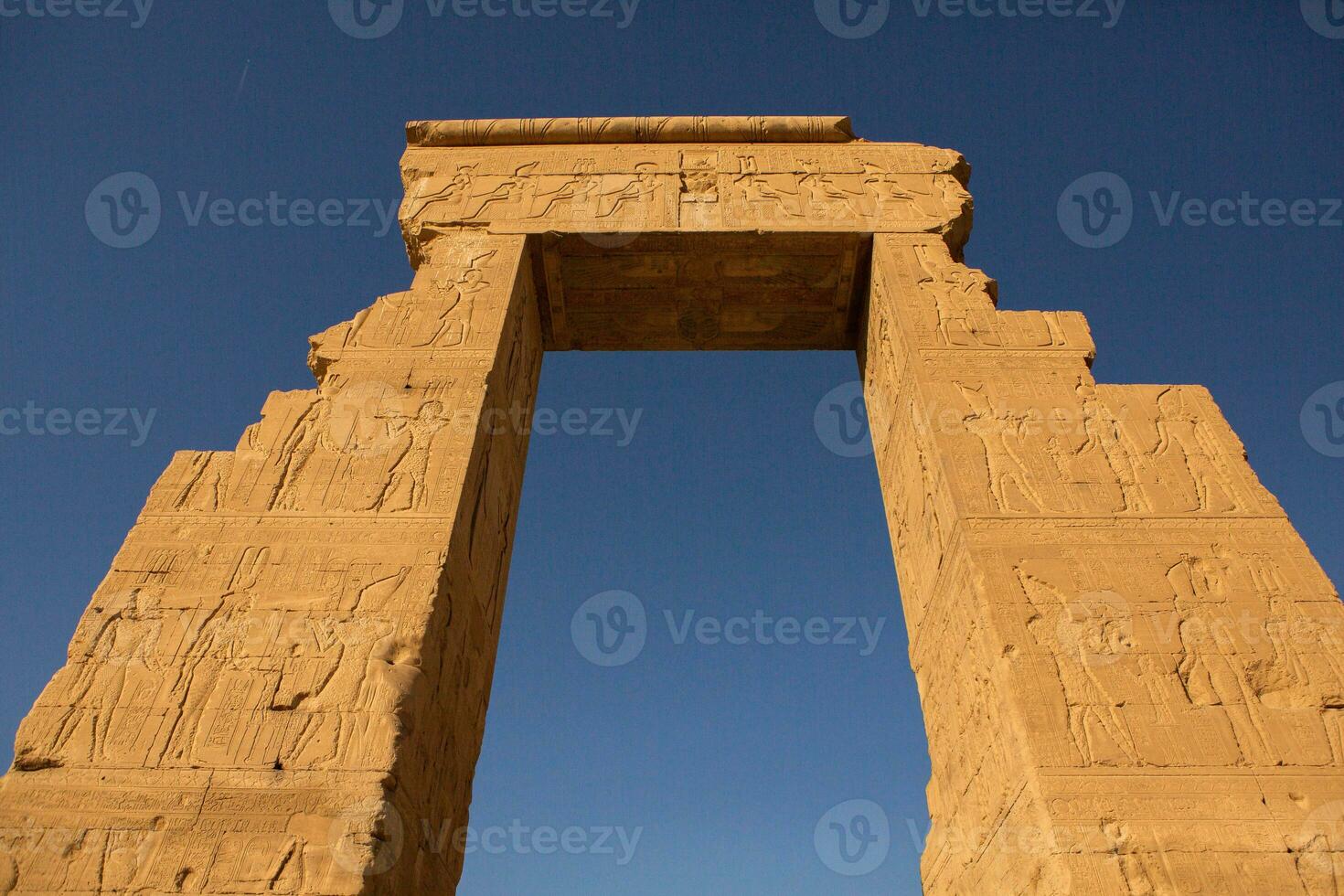 Dendera Temple complex in Egypt. Hieroglypic carvings on wall at the ancient egyptian temple. photo