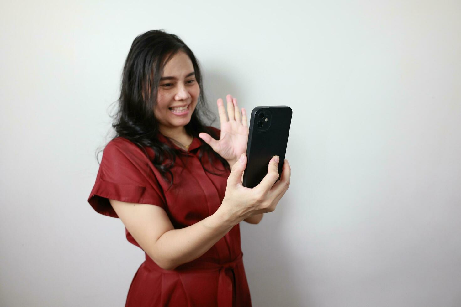 Woman holding smartphone, technology business concept photo