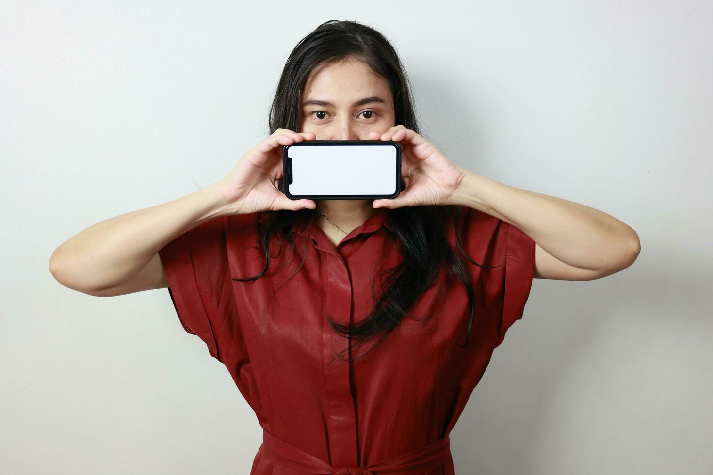 Person of a woman holding phone photo