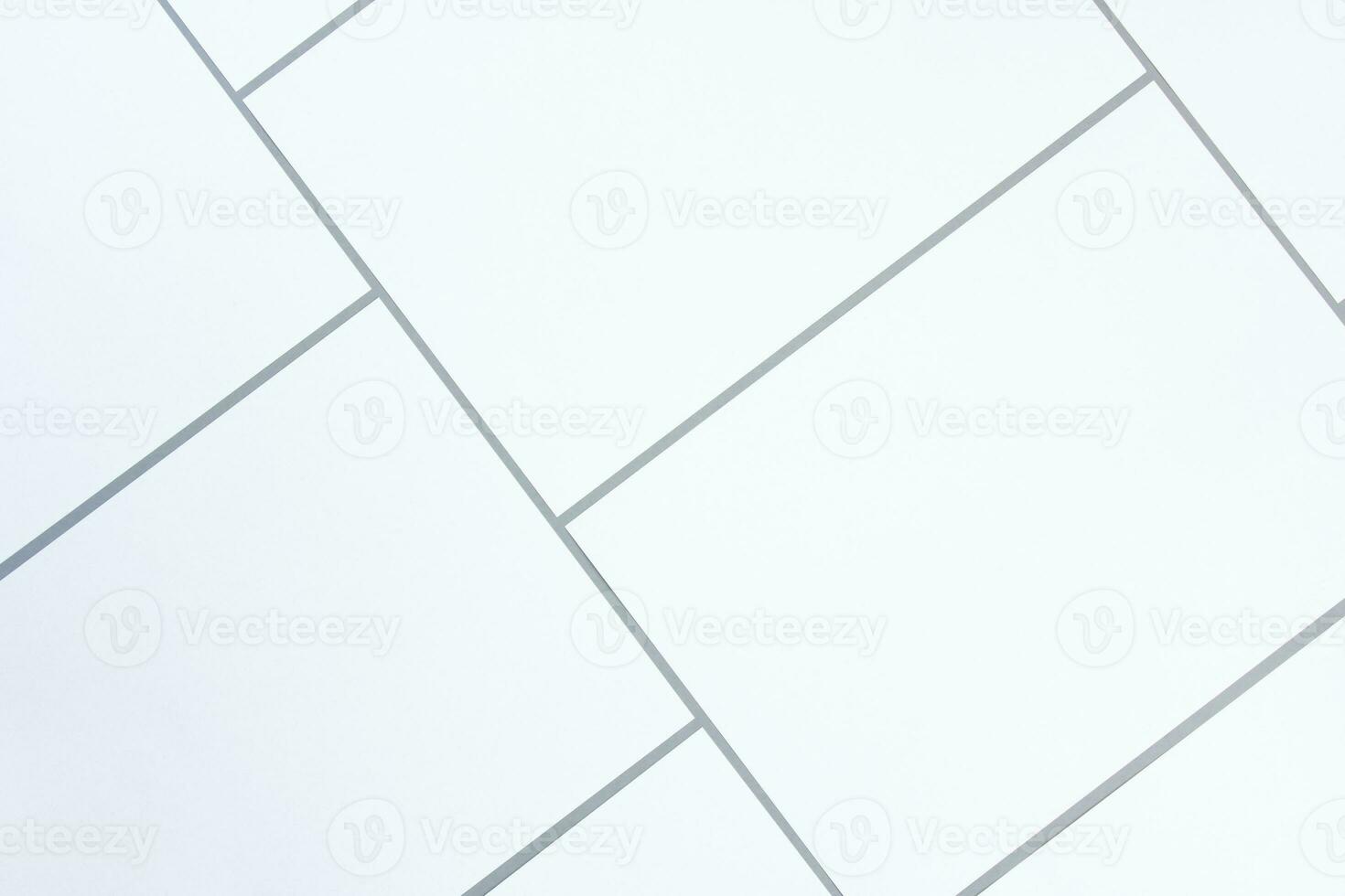 Empty white rectangle poster mockups on a gray background photo