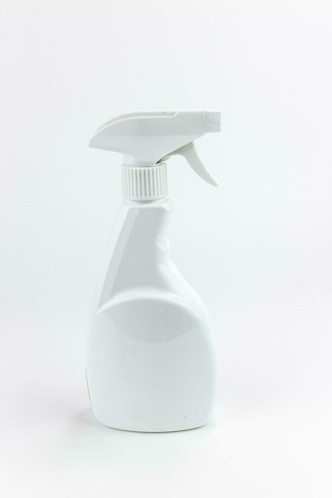 Spray bottle isolated on a white background. Cleaning products. photo