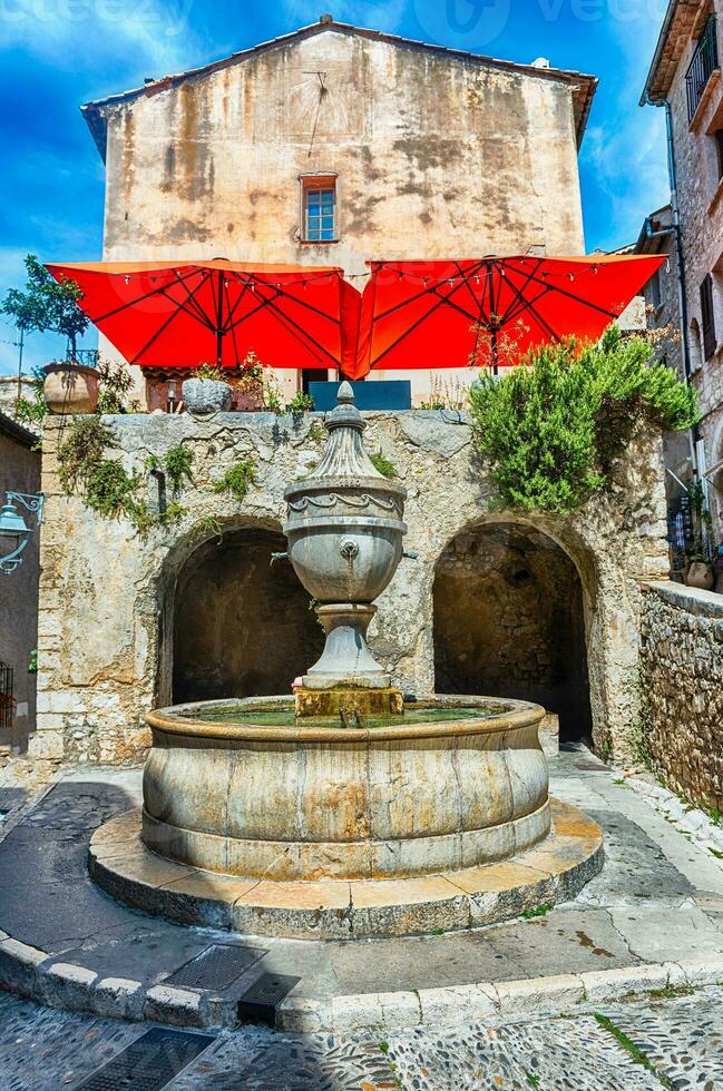 Walking in the picturesque streets of Saint-Paul-de-Vence, Cote d'Azur, France photo