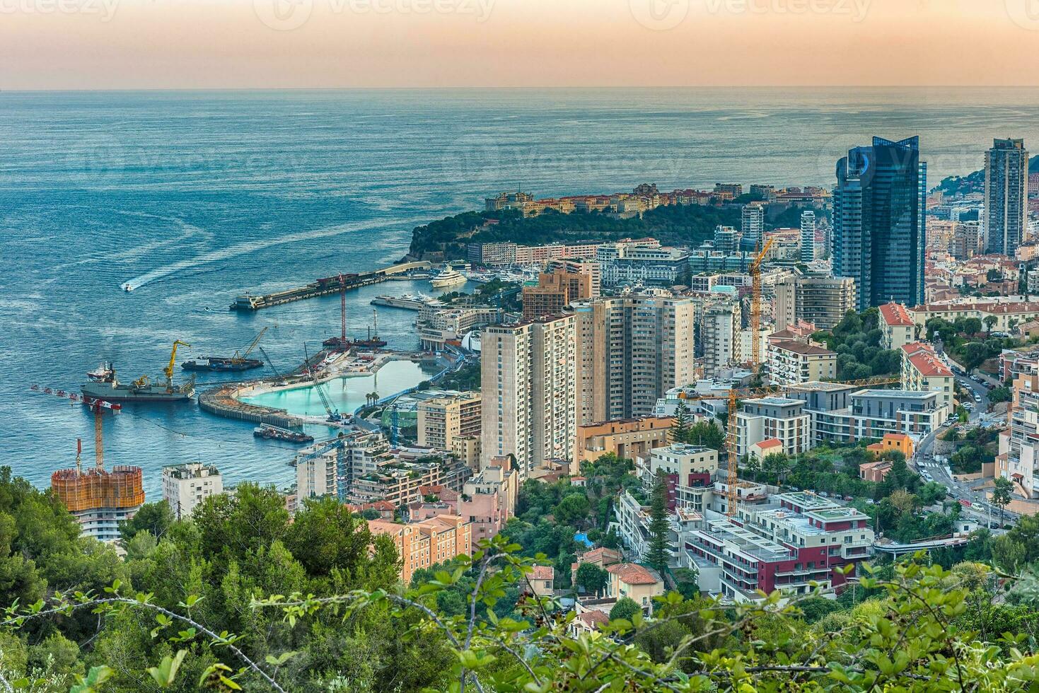 Panoramic view of Monaco at sunset from the Grande Corniche photo